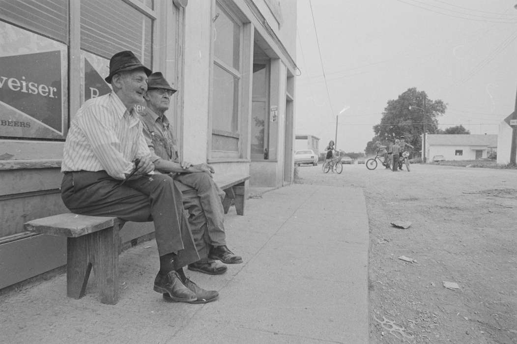 bench, Cities and Towns, elderly, bicycle, storefront, Lemberger, LeAnn, bike, dirt road, sign, history of Iowa, Leisure, Businesses and Factories, Melrose, IA, Iowa, Iowa History, Children
