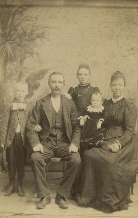 Olsson, Ann and Jons, father, baby, family, cabinet photo, bow tie, jewelry, mother, Davenport, IA, Iowa History, Portraits - Group, Families, painted backdrop, Iowa, brothers, history of Iowa, sister, Children