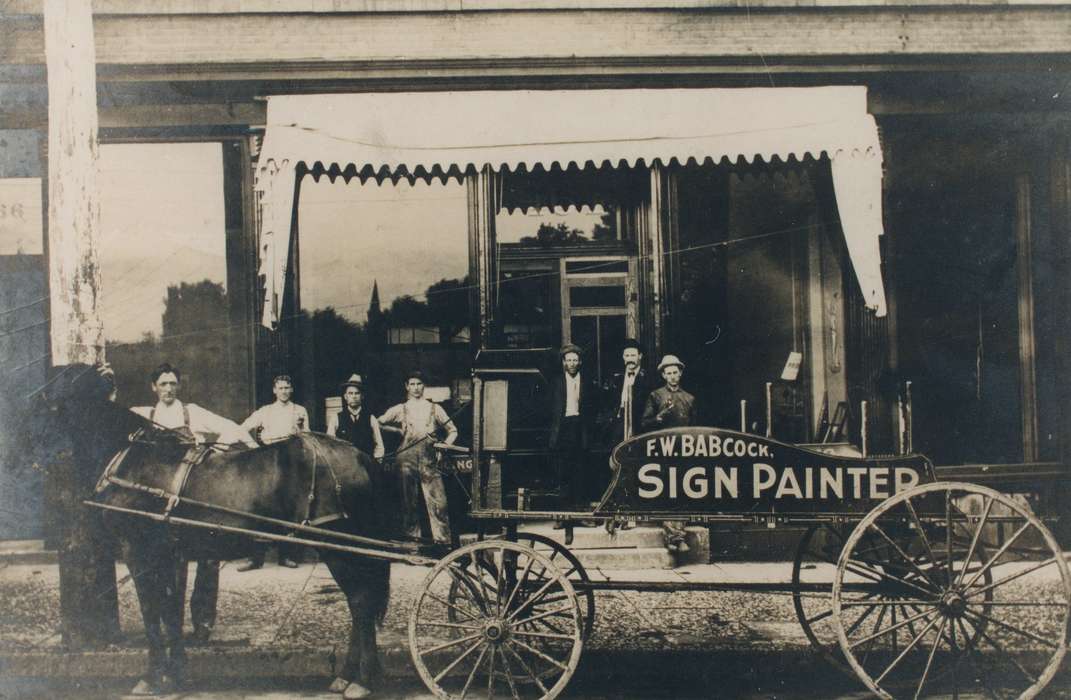 Labor and Occupations, painting, overalls, sign painting, Waverly, IA, Portraits - Group, Cities and Towns, history of Iowa, Businesses and Factories, hat, Iowa History, Animals, Iowa, Waverly Public Library, horse and buggy, Main Streets & Town Squares, horse, buggy, wheel, tuxedo