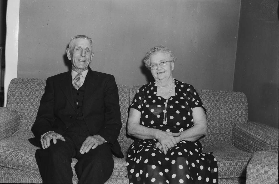 Portraits - Group, Iowa, couple, elderly, suit, black dress, IA, United States, Photos, historic, Coon Rapids, Coon Rapids Enterprise, Families, history, couch, ia, polka-dot