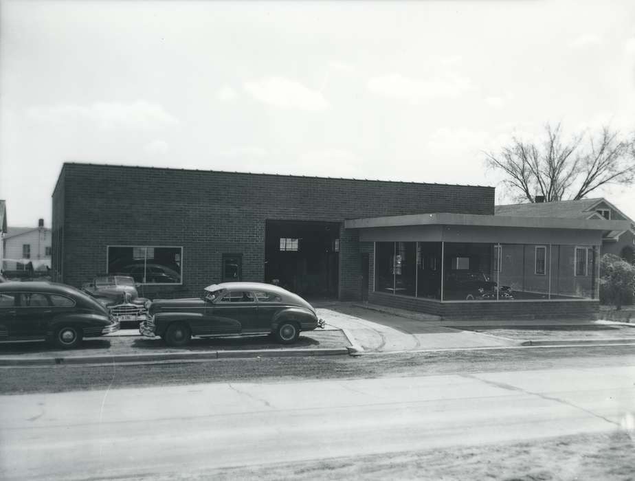 garage, brick building, automobile service, Iowa History, parking lot, Waverly Public Library, auto shop, Iowa, Businesses and Factories, history of Iowa