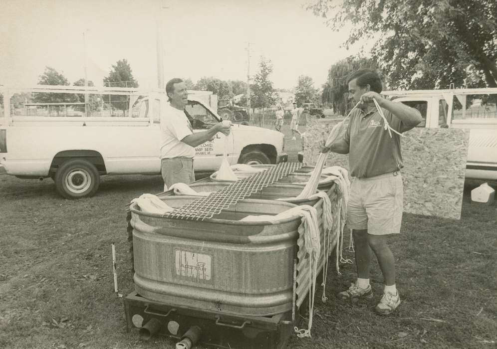 volunteer, Iowa History, pickup truck, Portraits - Group, fairgrounds, Iowa, correct date needed, Fairs and Festivals, Food and Meals, Waverly Public Library, Civic Engagement, Cities and Towns, water tank, history of Iowa, Motorized Vehicles