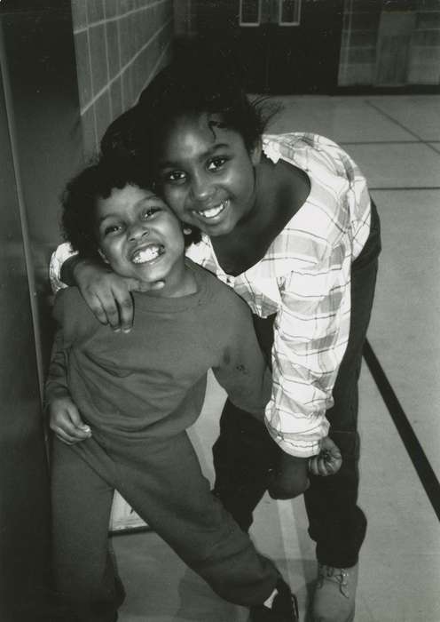 Black Hawk, girl, Portraits - Individual, boys & girls clubs of america, Boys & Girls Clubs of the Cedar Valley, hugging, IA, Iowa, boys and girls clubs of america, Children, ia, child, young adult, history, historic, Waterloo, United States, People of Color, Photos