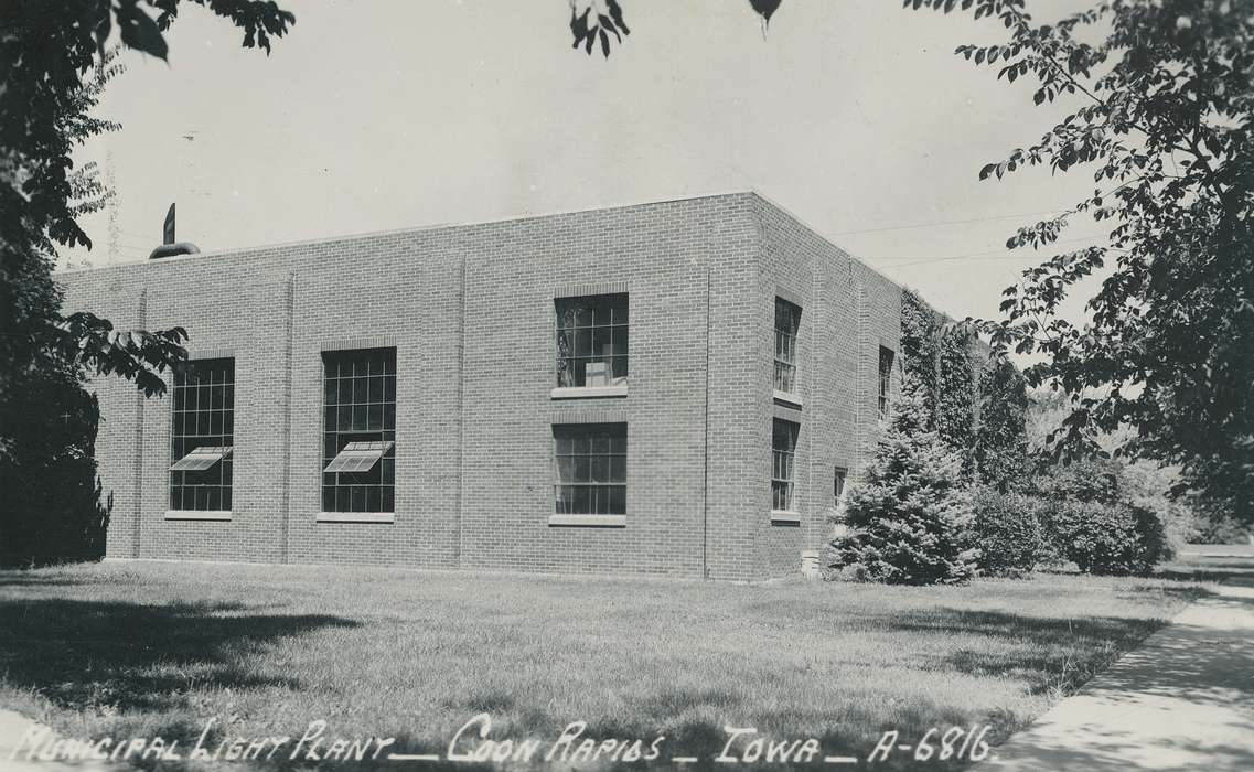 Cities and Towns, tree, Coon Rapids Enterprise, brick building, vine, window, correct date needed, Businesses and Factories