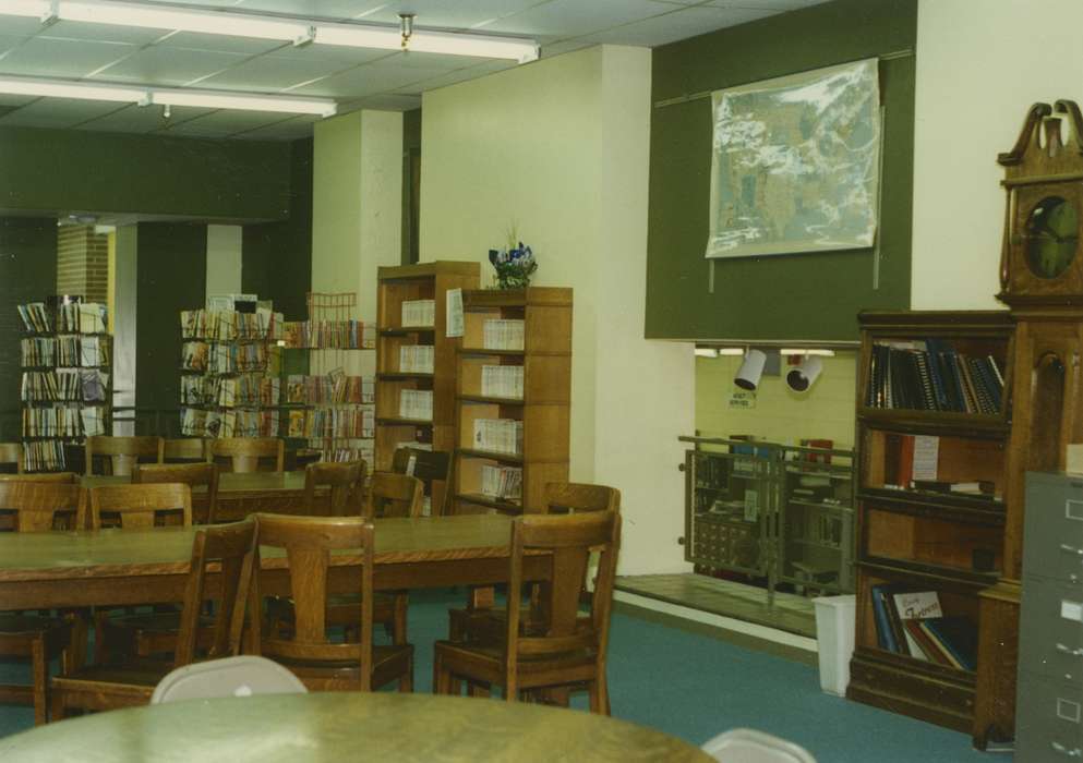 Leisure, table and chairs, Iowa History, bookshelf, books, Iowa, Waverly Public Library, grandfather clock, history of Iowa