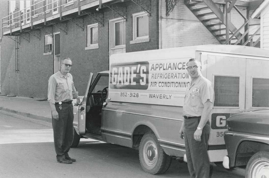 delivery truck, appliance, Iowa History, Families, Labor and Occupations, Iowa, Waverly Public Library, history of Iowa, man, Motorized Vehicles, air conditioner, truck, Portraits - Group, Waverly, IA, glasses, refrigerator, Businesses and Factories, uniform, fridge
