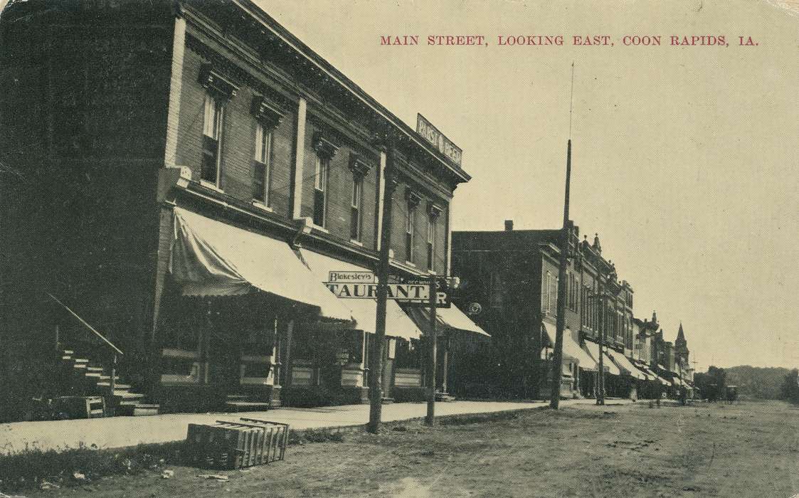 power line, correct date needed, Businesses and Factories, Cities and Towns, Coon Rapids Enterprise, dirt road, Main Streets & Town Squares, Labor and Occupations, awning, brick building