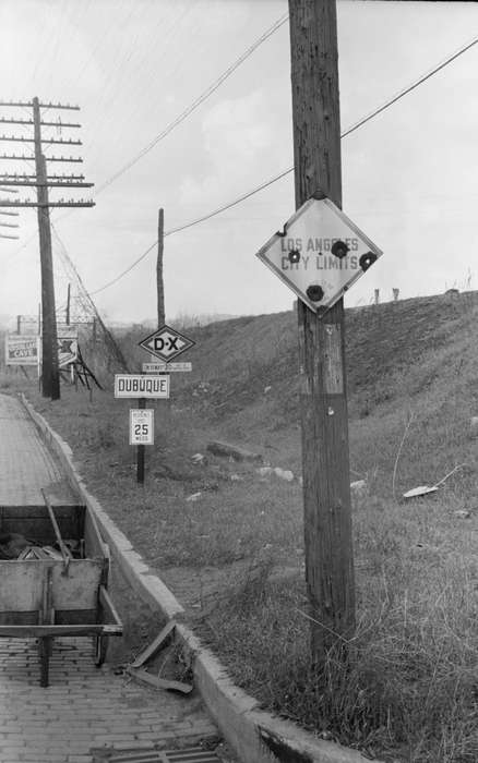 road sign, Cities and Towns, brick street, history of Iowa, electrical pole, Iowa, wheelbarrow, Library of Congress, Iowa History