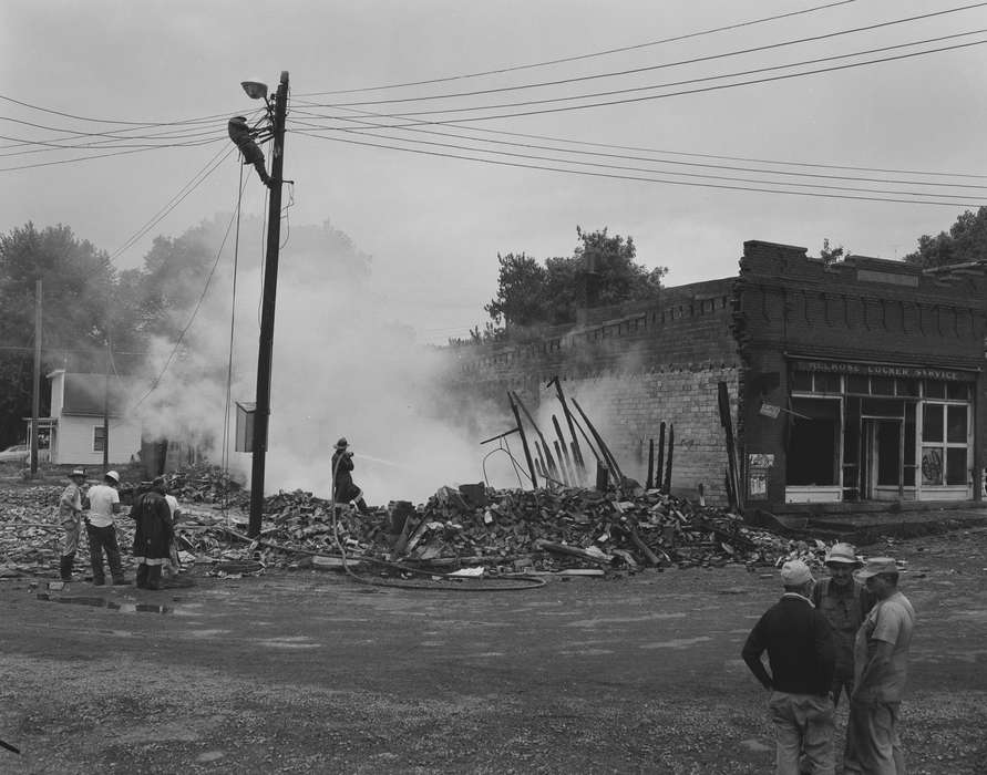 destruction, firefighter, fire, Businesses and Factories, history of Iowa, Iowa History, Cities and Towns, Wrecks, telephone pole, Lemberger, LeAnn, Labor and Occupations, hose, Iowa, Melrose, IA