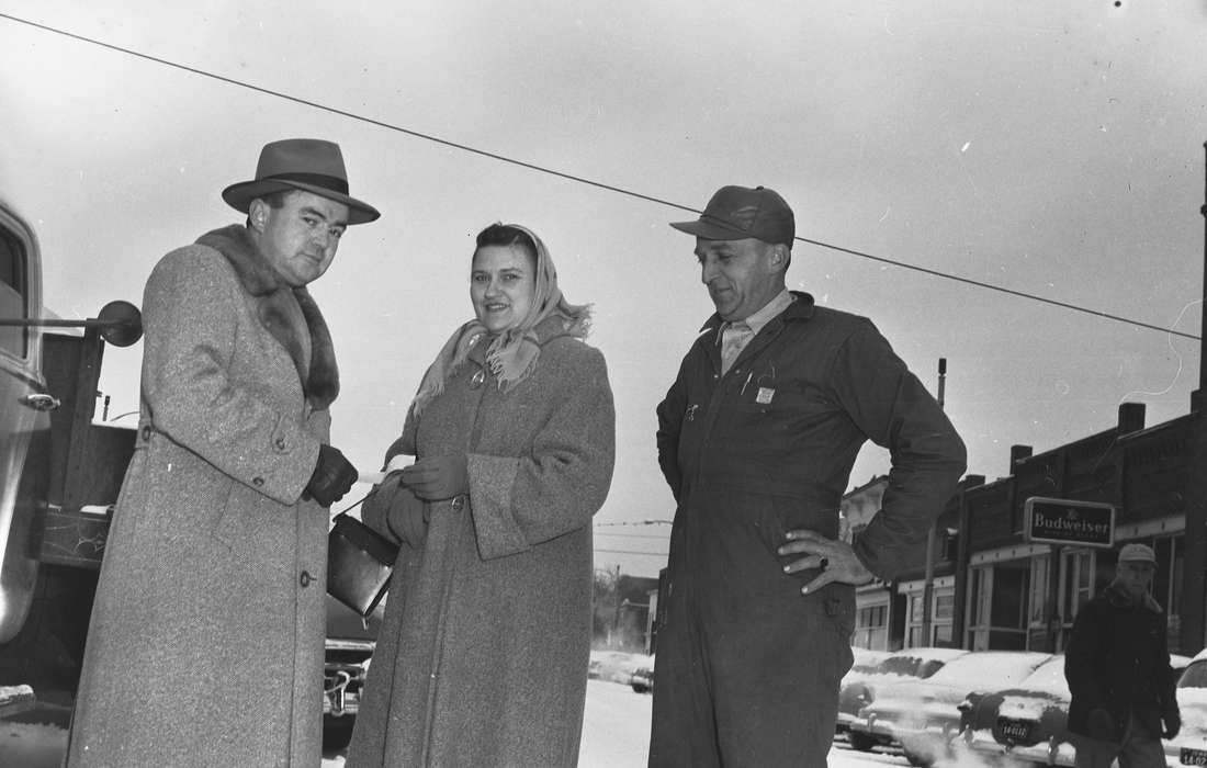 Portraits - Group, bonnet, history, Holidays, Photos, snow, Iowa, budweiser, IA, Cities and Towns, Motorized Vehicles, two men, United States, ia, woman, Coon Rapids Enterprise, panama hat, overcoat, historic, Coon Rapids