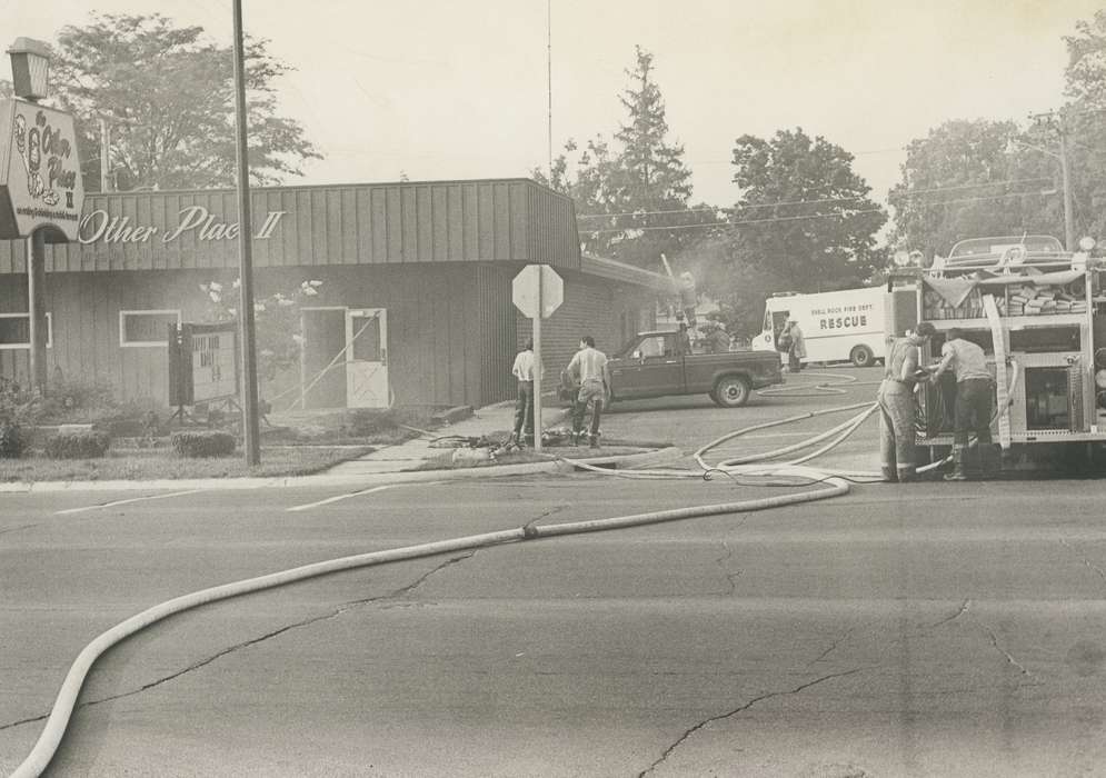Businesses and Factories, pizza, Waverly, IA, Iowa, Waverly Public Library, destruction, fire, hose, Main Streets & Town Squares, Motorized Vehicles, Iowa History, history of Iowa, firemen, Cities and Towns, fire truck, Labor and Occupations