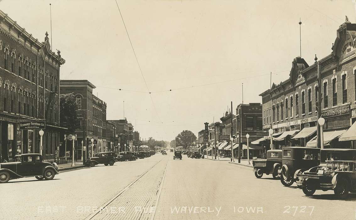 buildings, car, street, Meyer, Mary, Iowa History, lamppost, brick road, street lamp, cars, Cities and Towns, tracks, Motorized Vehicles, trolley, history of Iowa, Iowa, Businesses and Factories, Main Streets & Town Squares, street lamps