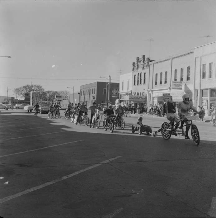 football players, IA, Sports, historic, Coon Rapids, Civic Engagement, bikes, Iowa, United States, parade, Photos, history, Main Streets & Town Squares, Entertainment, signs, ia, Coon Rapids Enterprise, Children