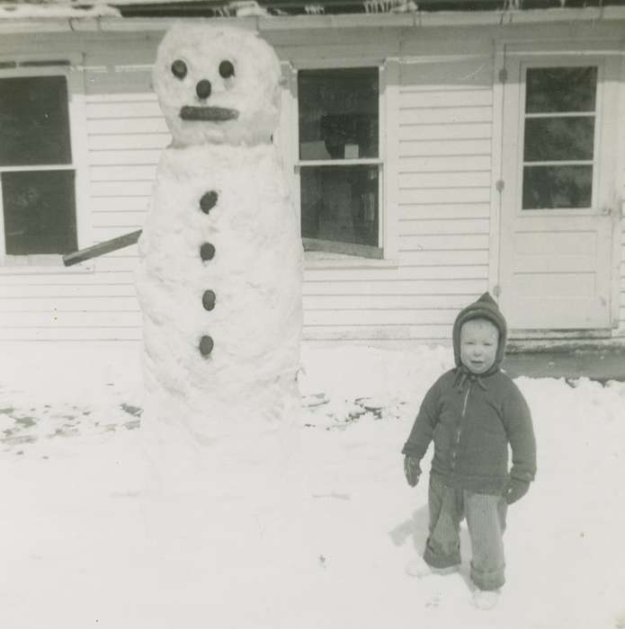 Portraits - Individual, snowman, Lamont, IA, Winter, Iowa History, history of Iowa, Rettinger, Michael, Children, snow, Iowa