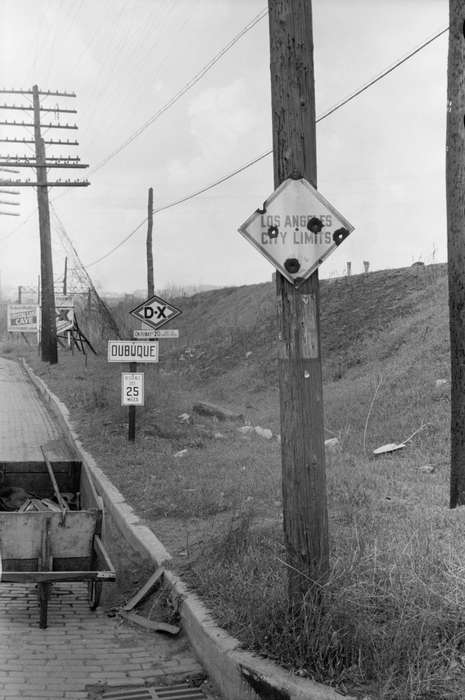 traffic sign, Landscapes, brick road, road construction, electrical pole, Iowa History, construction equipment, power lines, Iowa, history of Iowa, wheelbarrow, Library of Congress