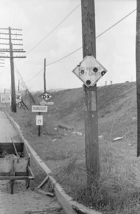 Landscapes, construction equipment, road construction, electrical pole, wheelbarrow, Iowa History, history of Iowa, power lines, Library of Congress, brick road, Iowa, traffic sign