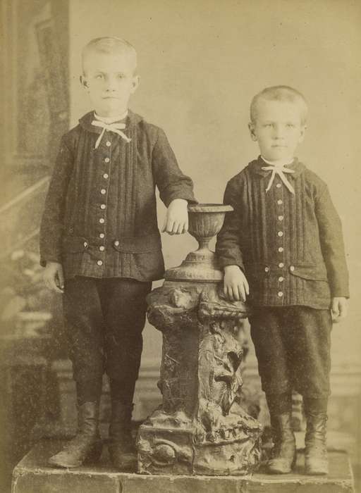 brothers, Olsson, Ann and Jons, high buttoned shoes, painted backdrop, siblings, Children, children, Iowa, Iowa History, cabinet photo, knickers, Independence, IA, Portraits - Group, bow tie, history of Iowa