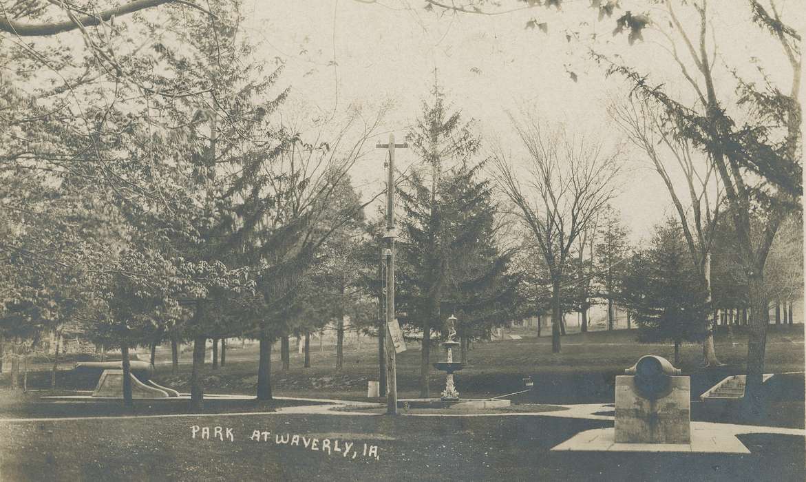 tree, Iowa History, pine tree, sidewalk, park, fountain, trees, Iowa, history of Iowa, Meyer, Mary, cannon, side walk, Cities and Towns