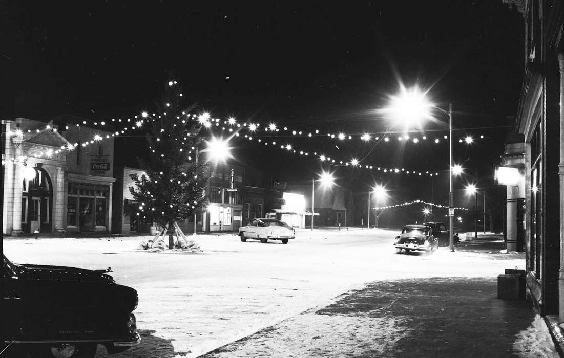 Businesses and Factories, streetlights, storefronts, history, Holidays, Photos, snow, Iowa, IA, christmas tree, Cities and Towns, Motorized Vehicles, United States, ia, Coon Rapids Enterprise, historic, coca cola, christmas lights, cars, Coon Rapids