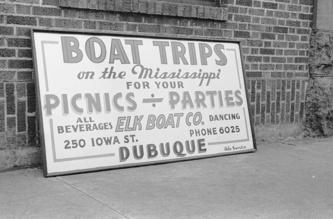 sidewalk, Cities and Towns, brick building, sign, Iowa History, advertisement, history of Iowa, mississippi river, boat trip advertisement, Library of Congress, Iowa