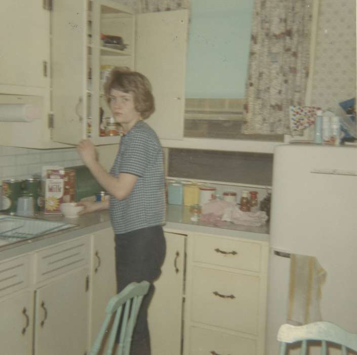 refrigerator, cabinet, Scholtec, Emily, Portraits - Individual, Homes, Iowa, Iowa History, Food and Meals, IA, kitchen, history of Iowa, milk, curtain