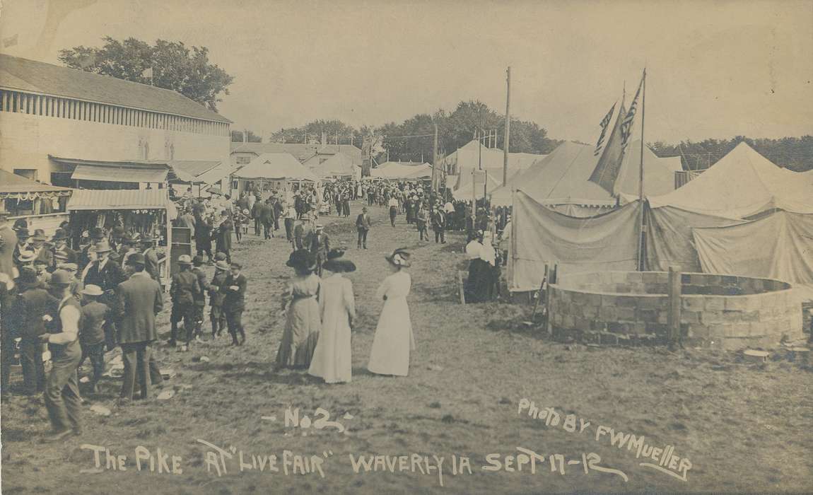 panama hat, Fairs and Festivals, ivy cap, Iowa, bowler hat, boater hat, sun hat, crowd, Cities and Towns, gathering, hats, tent, event, Iowa History, history of Iowa, fedora, Meyer, Mary, stalls