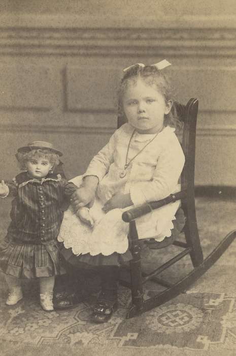 rocking chair, doll, girl, necklace, Portraits - Individual, Iowa History, Waverly, IA, Meyer, Sarah, Iowa, history of Iowa, Children