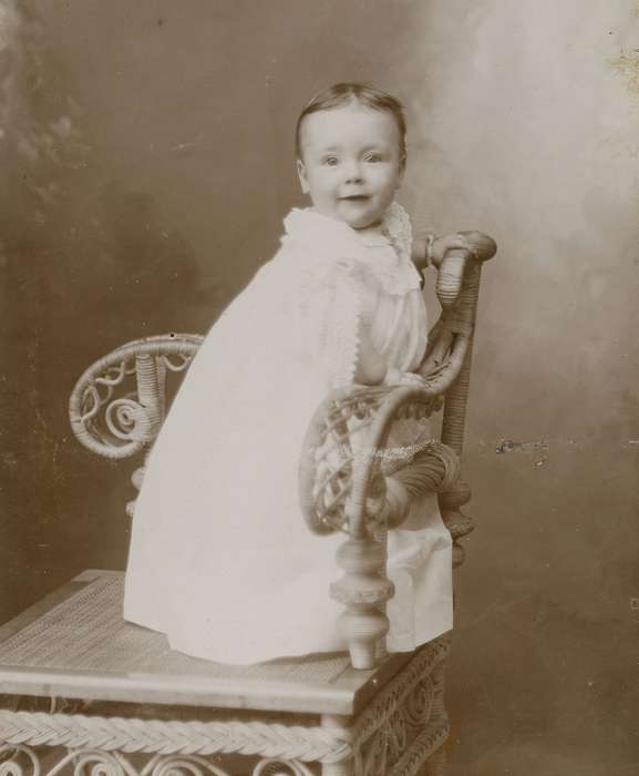 Children, baby, cabinet photo, wicker chair, Iowa History, Iowa, history of Iowa, Portraits - Individual, lace collar, girl, Olsson, Ann and Jons, Reinbeck, IA