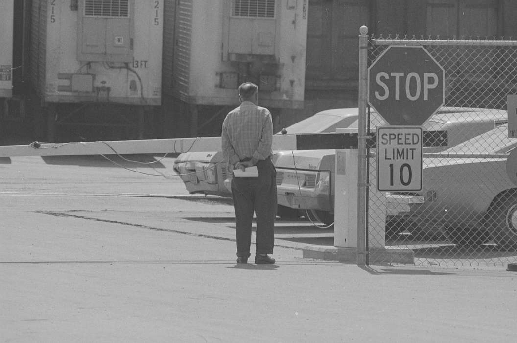 Lemberger, LeAnn, stop sign, Labor and Occupations, Ottumwa, IA, history of Iowa, Cities and Towns, parking lot, car, Iowa, Iowa History, meat packing plant, Motorized Vehicles, Businesses and Factories