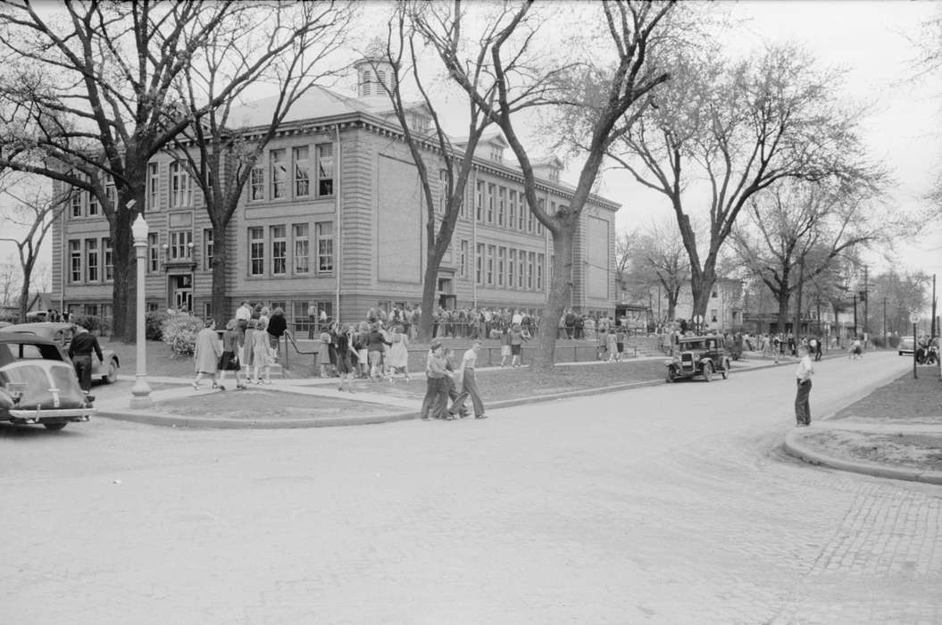 trees, Children, Library of Congress, high school, cobblestone street, Iowa History, Motorized Vehicles, history of Iowa, student, ford model a, intersection, lamppost, automobile, newton high school, car, Schools and Education, Iowa