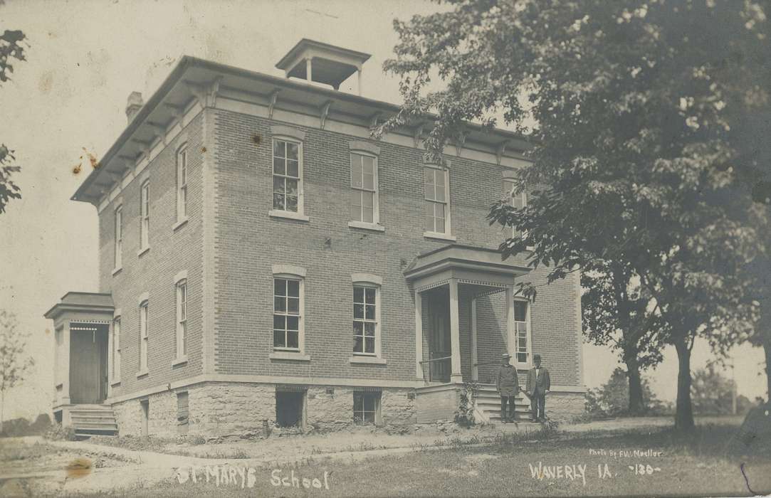 bowler, boater hat, window, Iowa History, building, steps, porch, Meyer, Mary, Religion, stairs, windows, brick, Schools and Education, school, Iowa, history of Iowa, columns, Cities and Towns, men