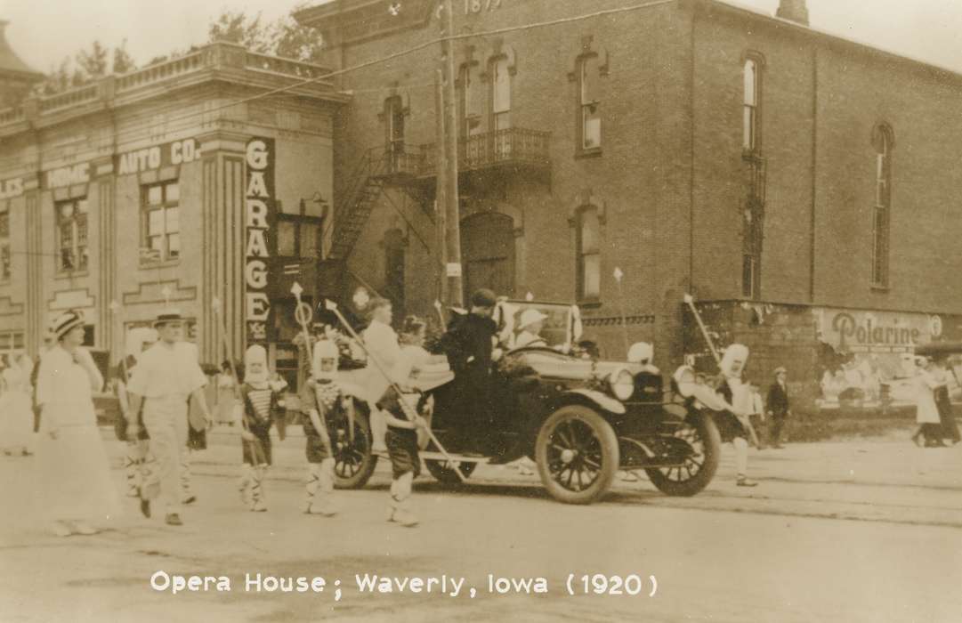 parade, fire escape, costume, Meyer, Sarah, garage, straw hat, Civic Engagement, Iowa, Iowa History, Motorized Vehicles, history of Iowa, Main Streets & Town Squares, opera house, Entertainment, Waverly, IA, Cities and Towns, Children, car