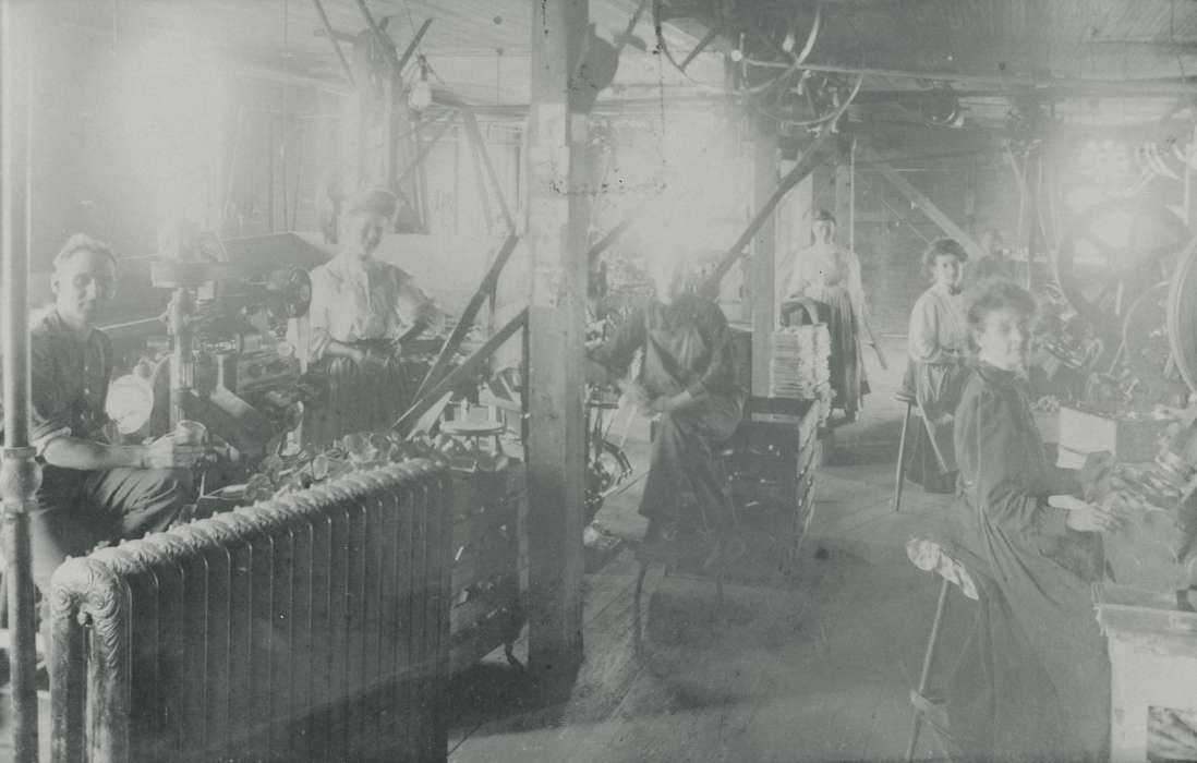 machinery, radiator, woman, Iowa, correct date needed, chair, Iowa History, Portraits - Group, Waverly, IA, Waverly Public Library, worker, Labor and Occupations, Businesses and Factories, history of Iowa
