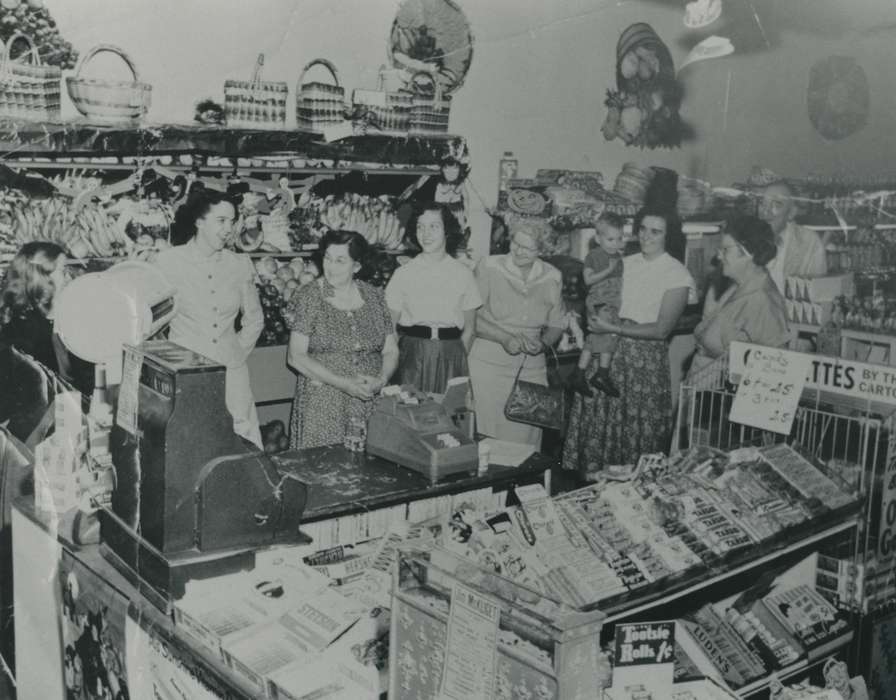 Waverly, IA, Businesses and Factories, bananas, apple, correct date needed, women, baskets, cash register, grocery store, history of Iowa, fruit, Waverly Public Library, candy, Iowa History, Iowa, adding machine, halloween, produce