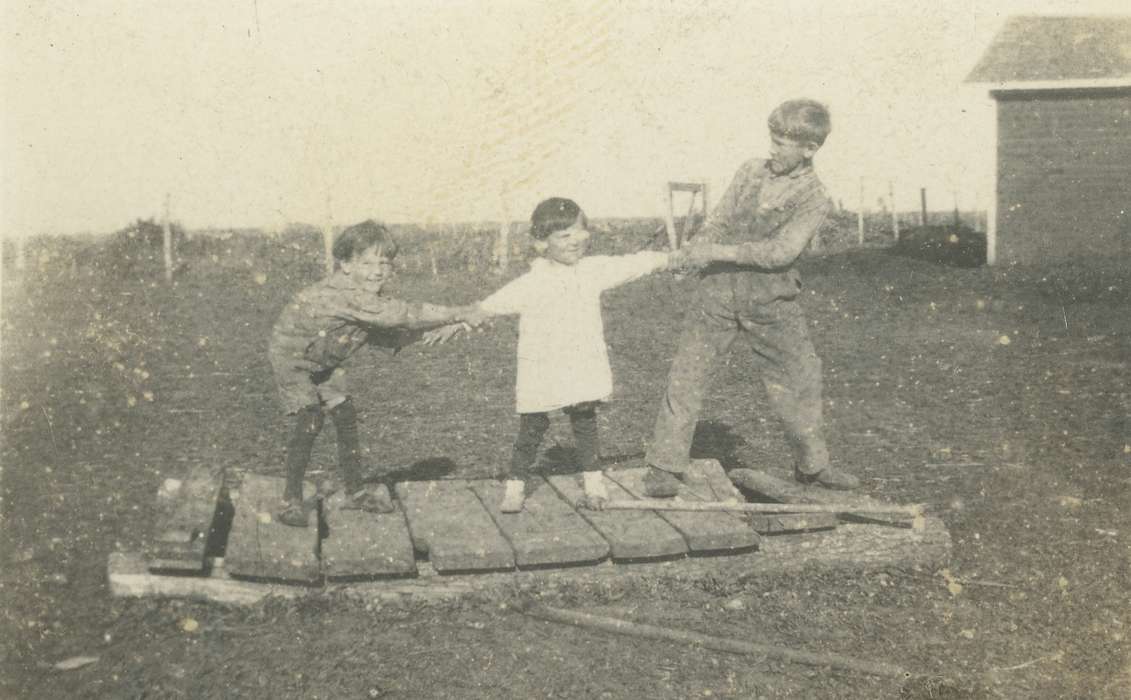 Black Hawk, Iowa, Children, history, O'Brink, Lisa, Waterloo, brothers, boys, child, overalls, ia, historic, United States, kids, Photos, tug of war, playing, children, boy, silly, IA
