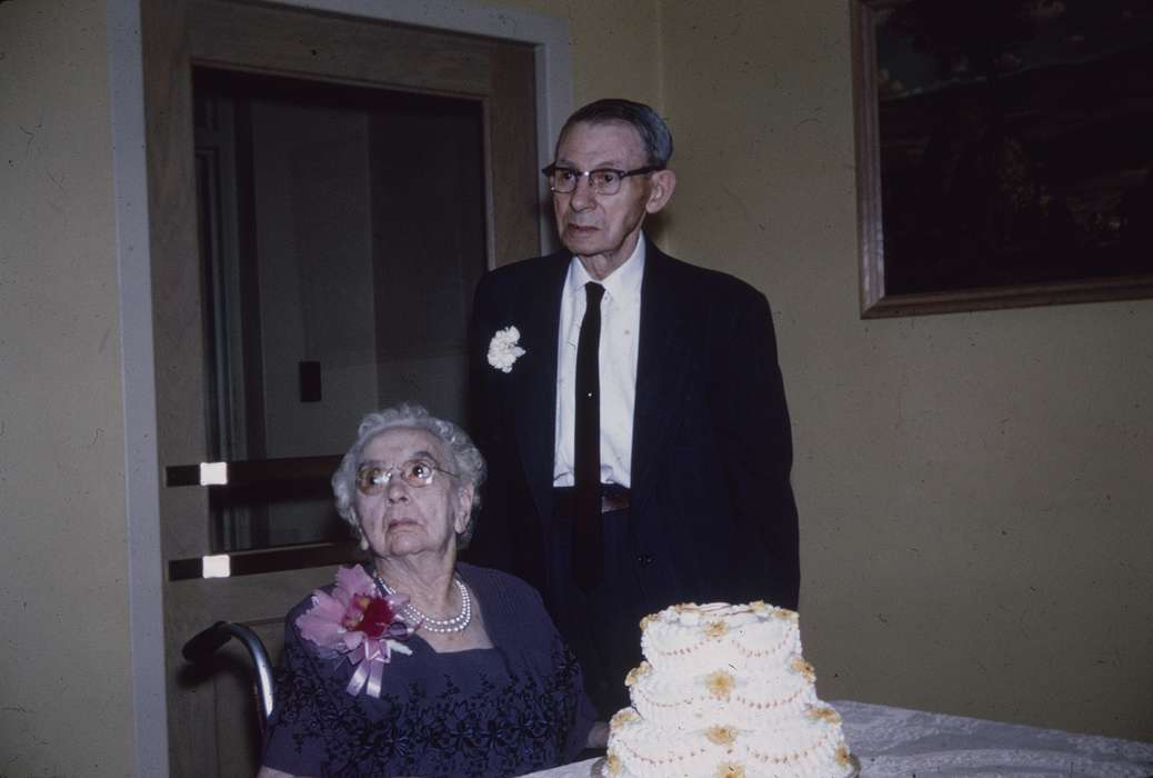 glasses, tie, cake, suit, correct date needed, Western Home Communities, necklace, Iowa History, Iowa, Food and Meals, Leisure, dress, history of Iowa
