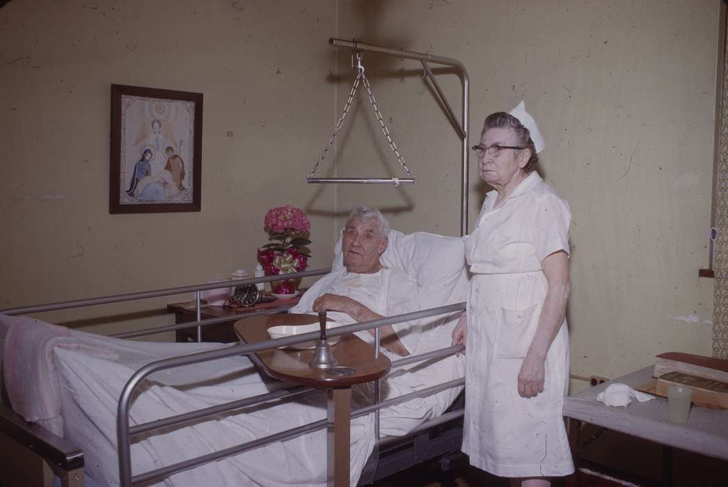 hospital bed, picture, nurse, Iowa, flowers, Portraits - Group, cup, flower, bell, Iowa History, history of Iowa, Western Home Communities, glasses, clock, Businesses and Factories