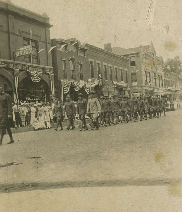 Anamosa, IA, procession, Main Streets & Town Squares, parade, drugstore, flag, Military and Veterans, military, storefront, Hatcher, Cecilia, Iowa History, mainstreet, Iowa, history of Iowa
