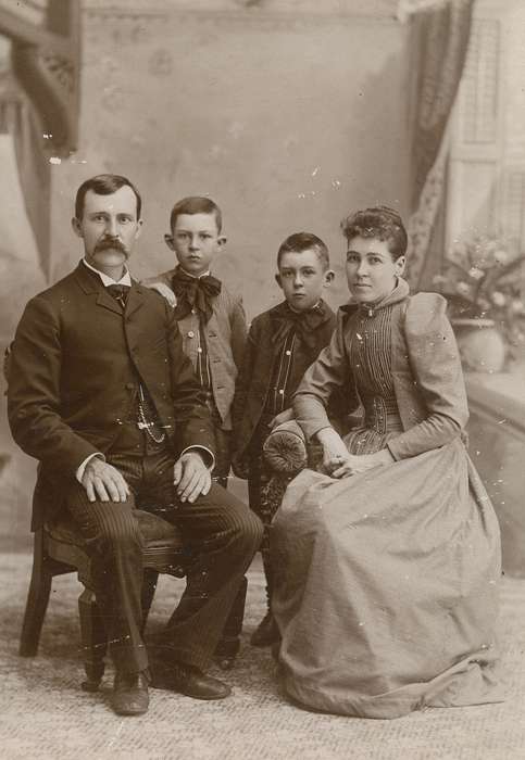 watch chain, Iowa, sack coat, bow tie, cabinet photo, Anamosa, IA, Portraits - Group, father, painted backdrop, Iowa History, history of Iowa, wing tip collar, frizzy bangs, mother, Olsson, Ann and Jons, son, family, Families