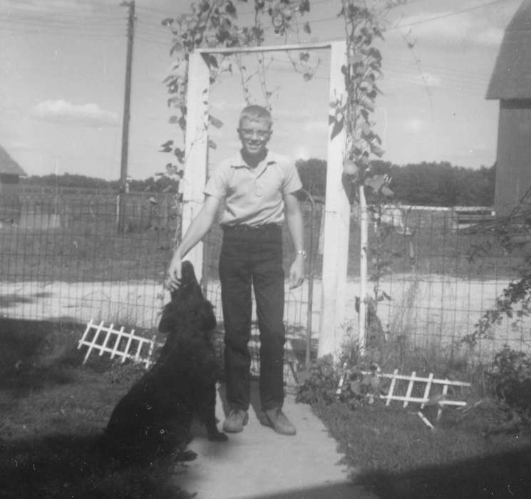 dog, garden, vine, Children, Cedar Falls, IA, Iowa History, Farms, Hahn, Cindy, Portraits - Individual, Animals, Iowa, boy, history of Iowa