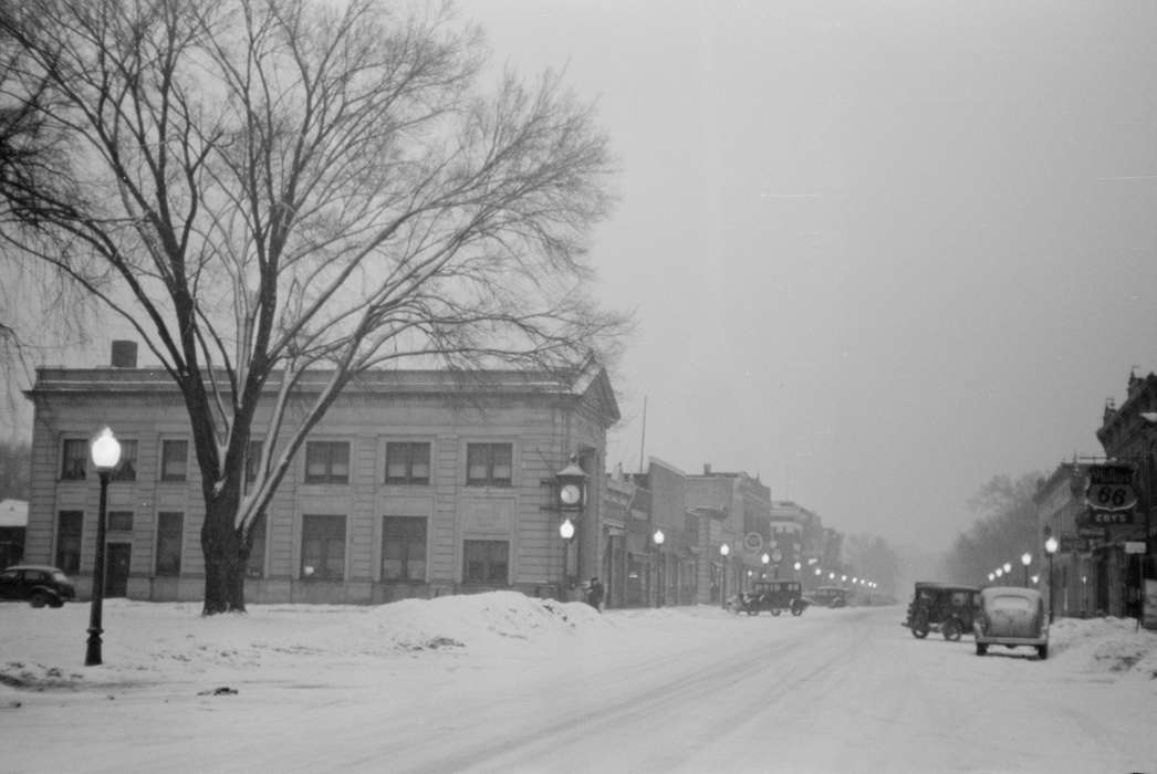 lamppost, Cities and Towns, snowdrift, tree, Iowa History, snow, cars, history of Iowa, Businesses and Factories, Library of Congress, Main Streets & Town Squares, Motorized Vehicles, snowstorm, Iowa, Winter