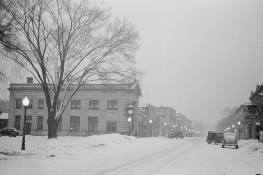 Businesses and Factories, Main Streets & Town Squares, Winter, snowstorm, automobile, car, Library of Congress, Cities and Towns, snow, Motorized Vehicles, snowdrift, Iowa, Iowa History, tree, lamppost, history of Iowa