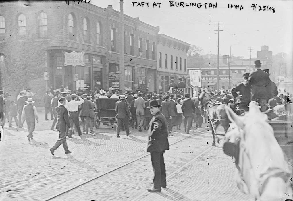 Library of Congress, Cities and Towns, Iowa History, crowd, Leisure, Businesses and Factories, Iowa, history of Iowa, Main Streets & Town Squares, storefront, Animals, brick street, mainstreet, hats, suits, Civic Engagement, campaign