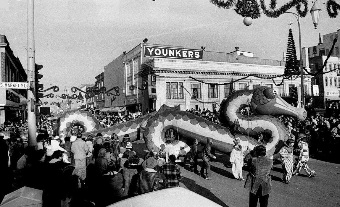 Cities and Towns, christmas, christmas decorations, dragon, balloon, younkers, history of Iowa, Main Streets & Town Squares, clown, Ottumwa, IA, main street, Businesses and Factories, coat, sign, Holidays, christmas tree, Iowa History, Families, Winter, Iowa, crowd, Entertainment, Lemberger, LeAnn, Children