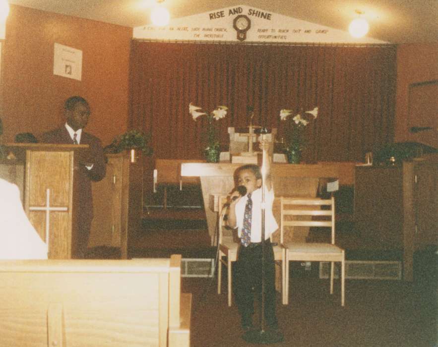 singer, history of Iowa, boy, Religion, Children, microphone, church, african american, Iowa History, Barrett, Sarah, Waterloo, IA, People of Color, Religious Structures, Iowa, singing