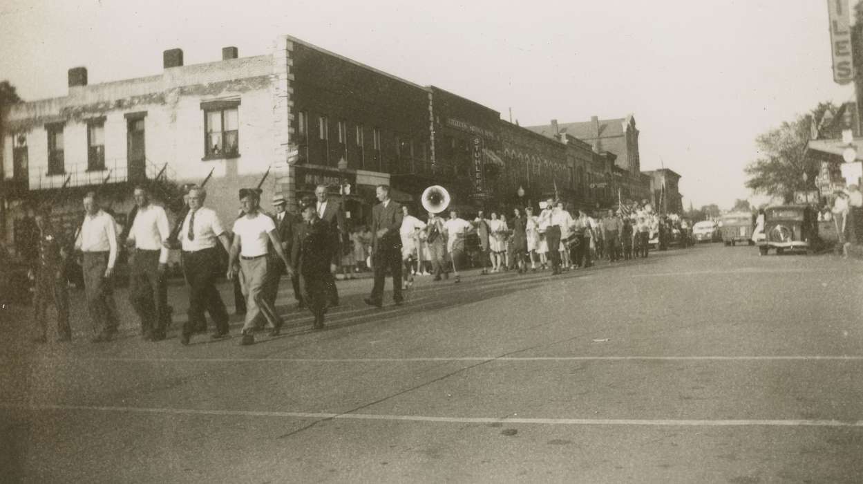 Businesses and Factories, Iowa, Hatcher, Cecilia, procession, car, Anamosa, IA, Main Streets & Town Squares, Motorized Vehicles, Military and Veterans, Entertainment, Iowa History, band, history of Iowa, Cities and Towns