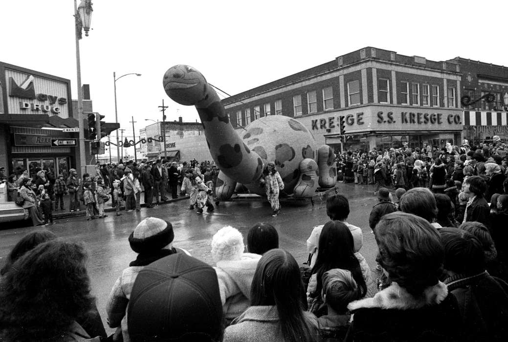 balloon, dinosaur, Main Streets & Town Squares, parade, Entertainment, Iowa History, Families, Cities and Towns, Iowa, Ottumwa, IA, crowd, float, history of Iowa, main street, clown, storefront, Children, Lemberger, LeAnn, store, Businesses and Factories