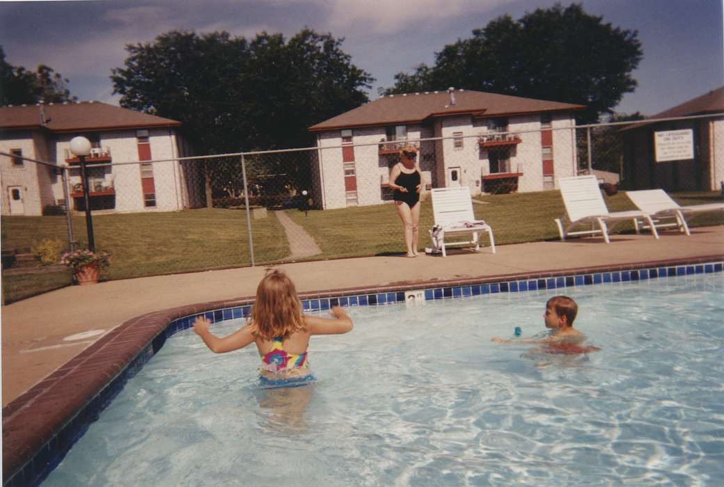 Leisure, bathing suit, Iowa, Children, IA, swimming suit, pool, history of Iowa, Iowa History, lawn chair, Scholtec, Emily, apartment, fence, swimsuit