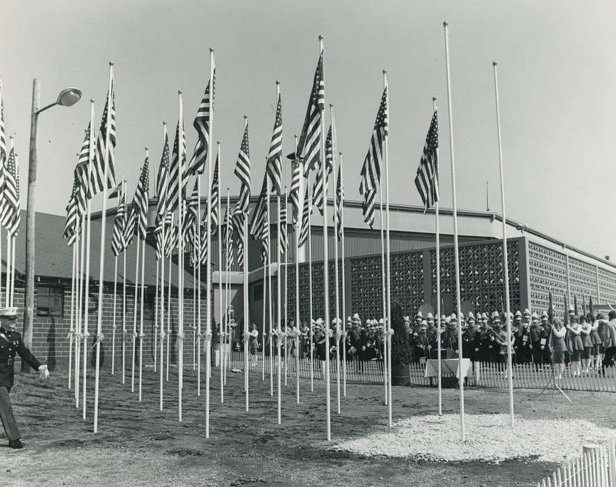 american flag display, IA, Fairs and Festivals, Black Hawk, historic, Iowa, national cattle congress, band, United States, Grout Museum of History and Science, ia, Entertainment, brick building, Waterloo, Photos, history, fence
