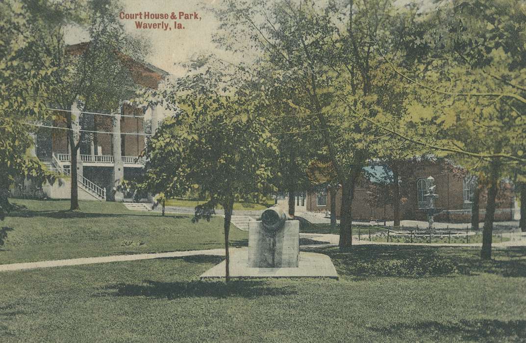 Landscapes, Main Streets & Town Squares, Cities and Towns, water fountain, Waverly, IA, Iowa History, history of Iowa, pillar, cannon, steps, power lines, postcard, court house, color, Meyer, Sarah, park, trees, Iowa